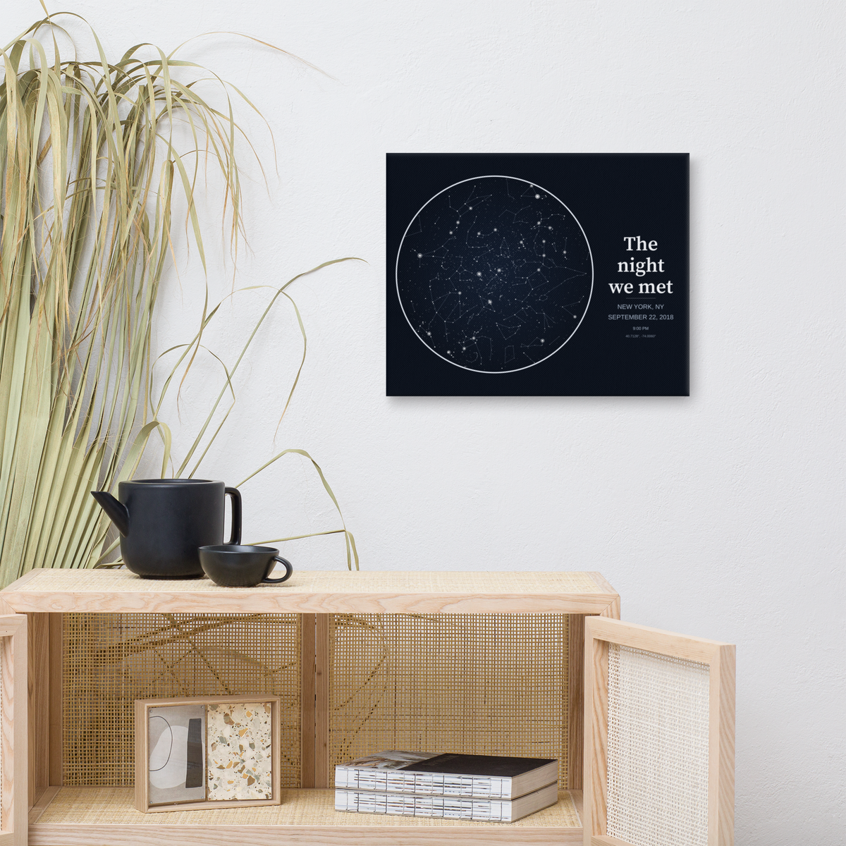 Bold statement star map canvas above a shelf in a living room
